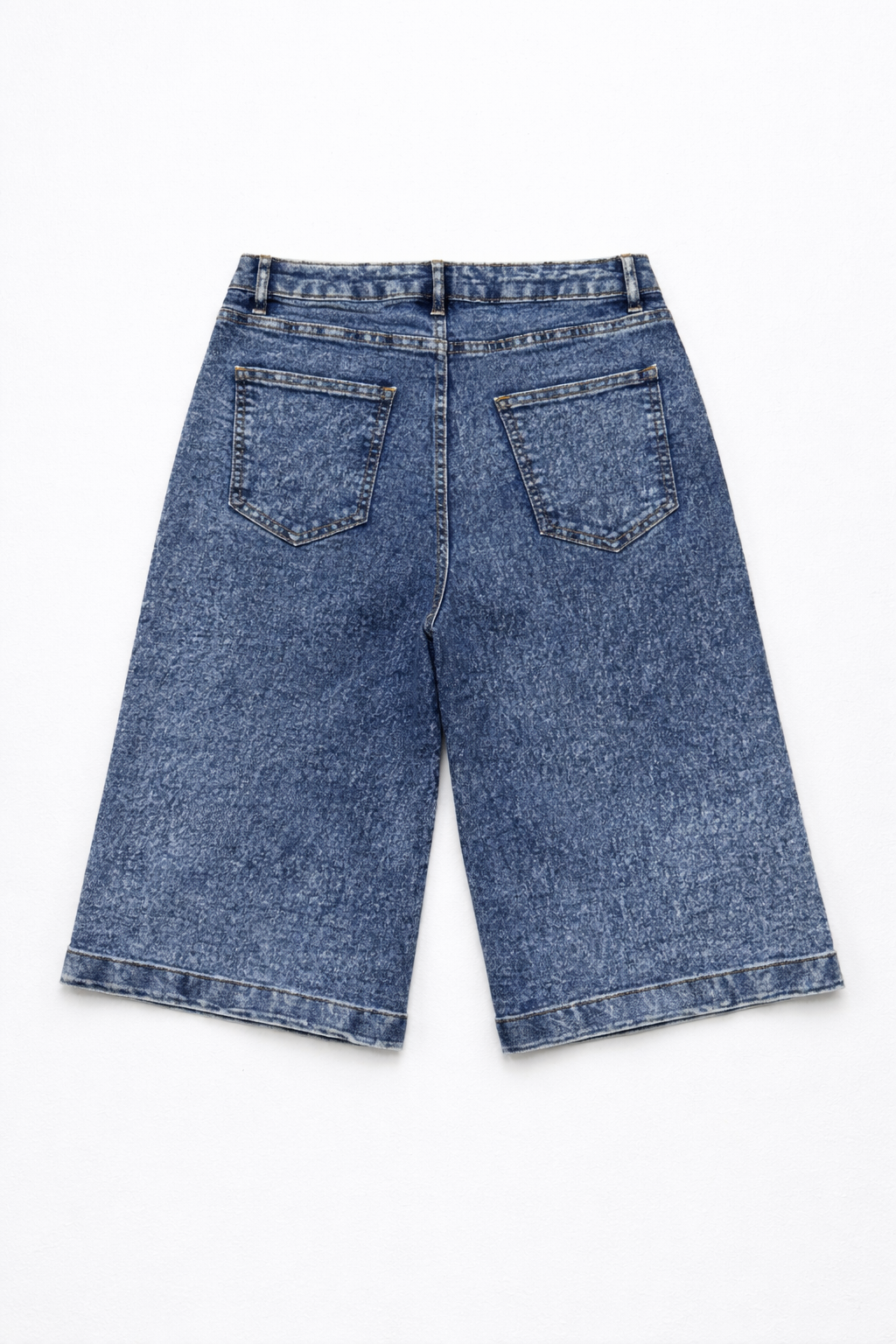 Snow wash blue denim shorts styled — Clutch Denim