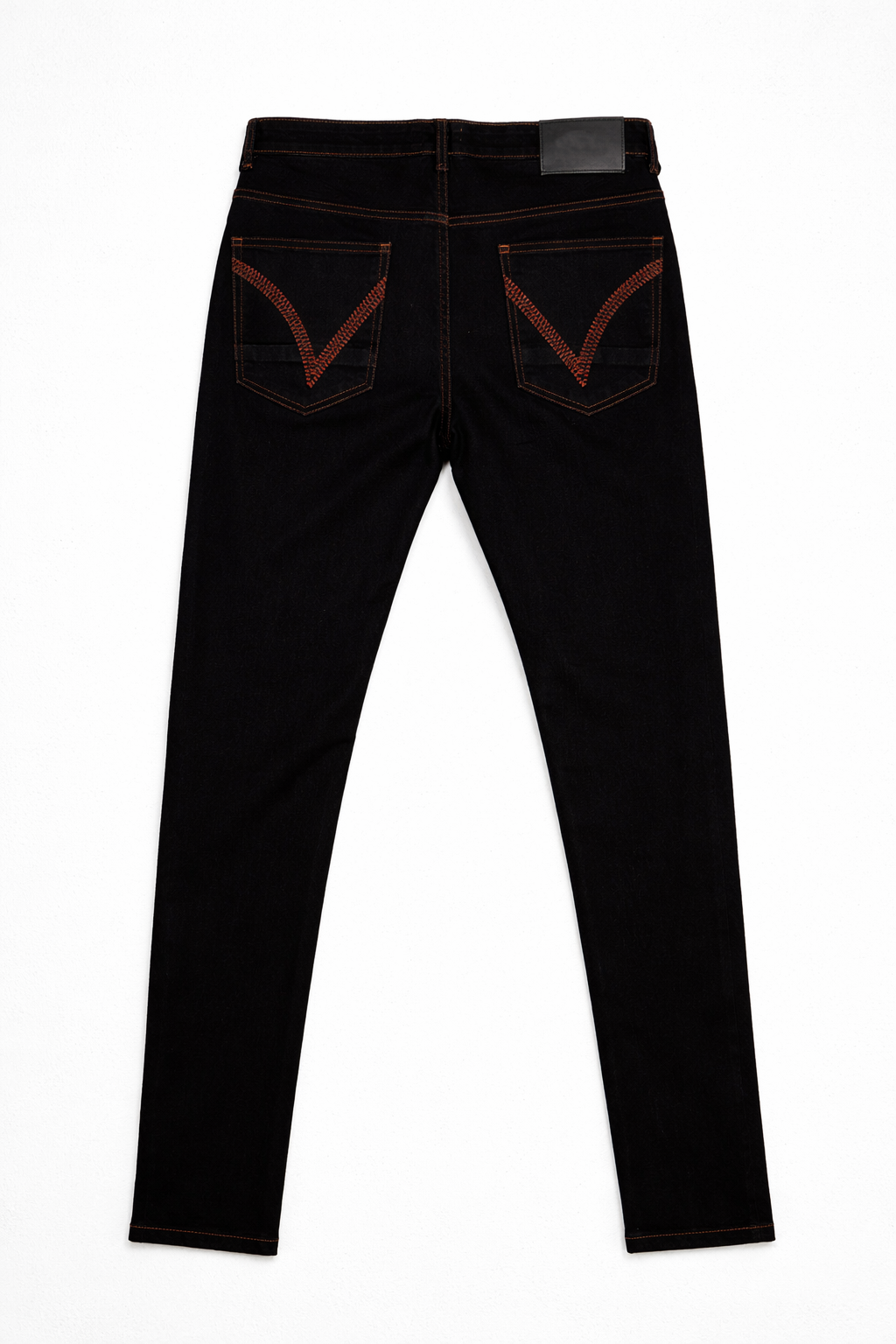 Black skinny jeans with red stitching back view — Clutch Denim