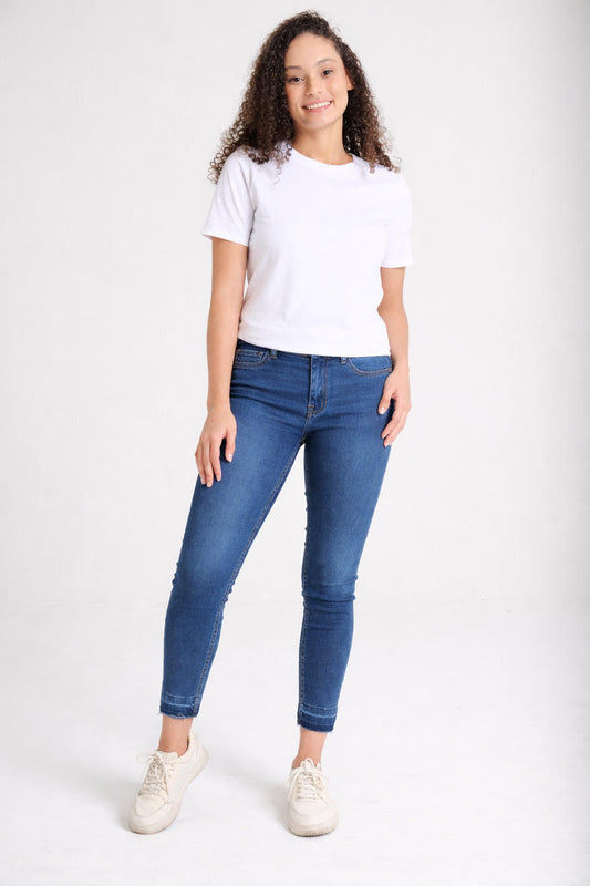 Women's high-rise skinny jeans in medium wash denim — Clutch Denim SA
