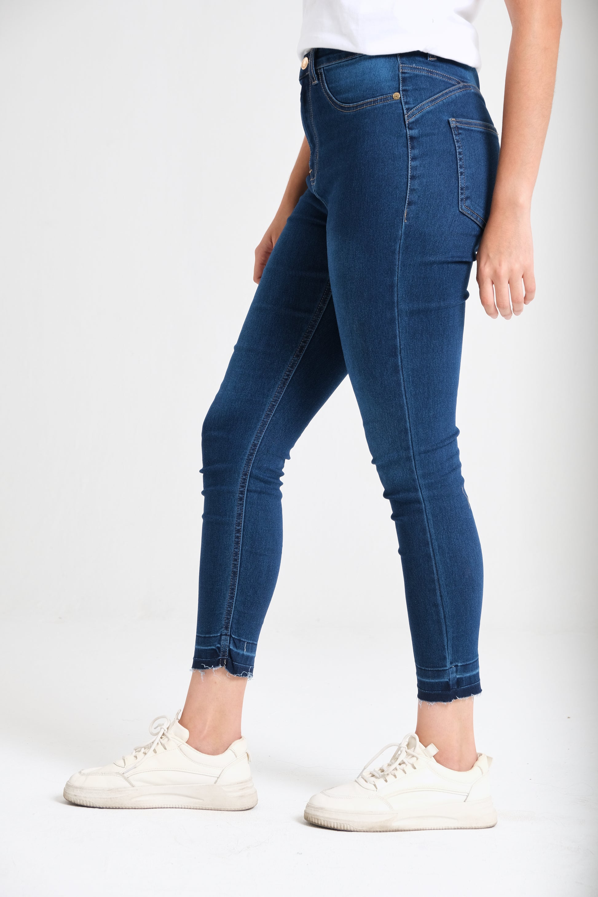 Raw-hem skinny jeans dark wash back view — Clutch Denim