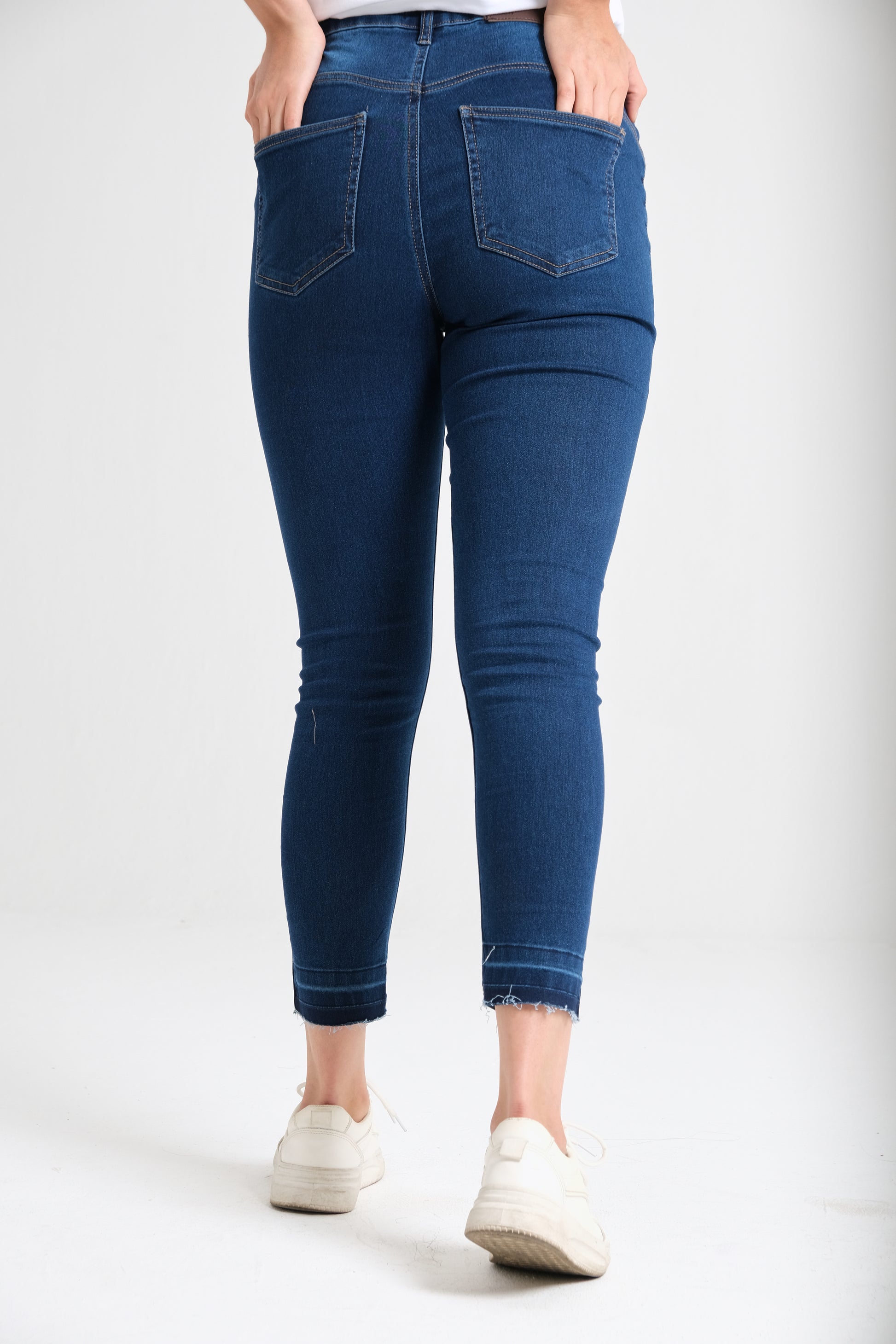 Dark wash skinny jeans detail — Clutch Denim
