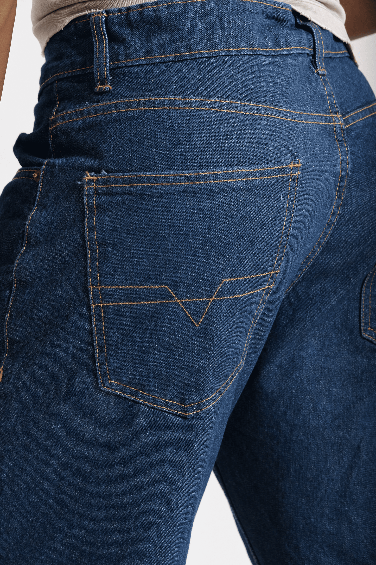 Men's indigo straight-leg jeans on model — Clutch Denim