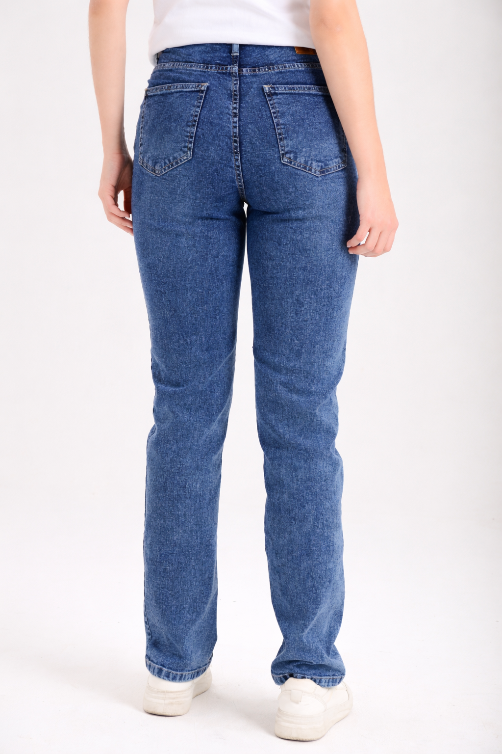 Women's straight-leg jeans side view — Clutch Denim