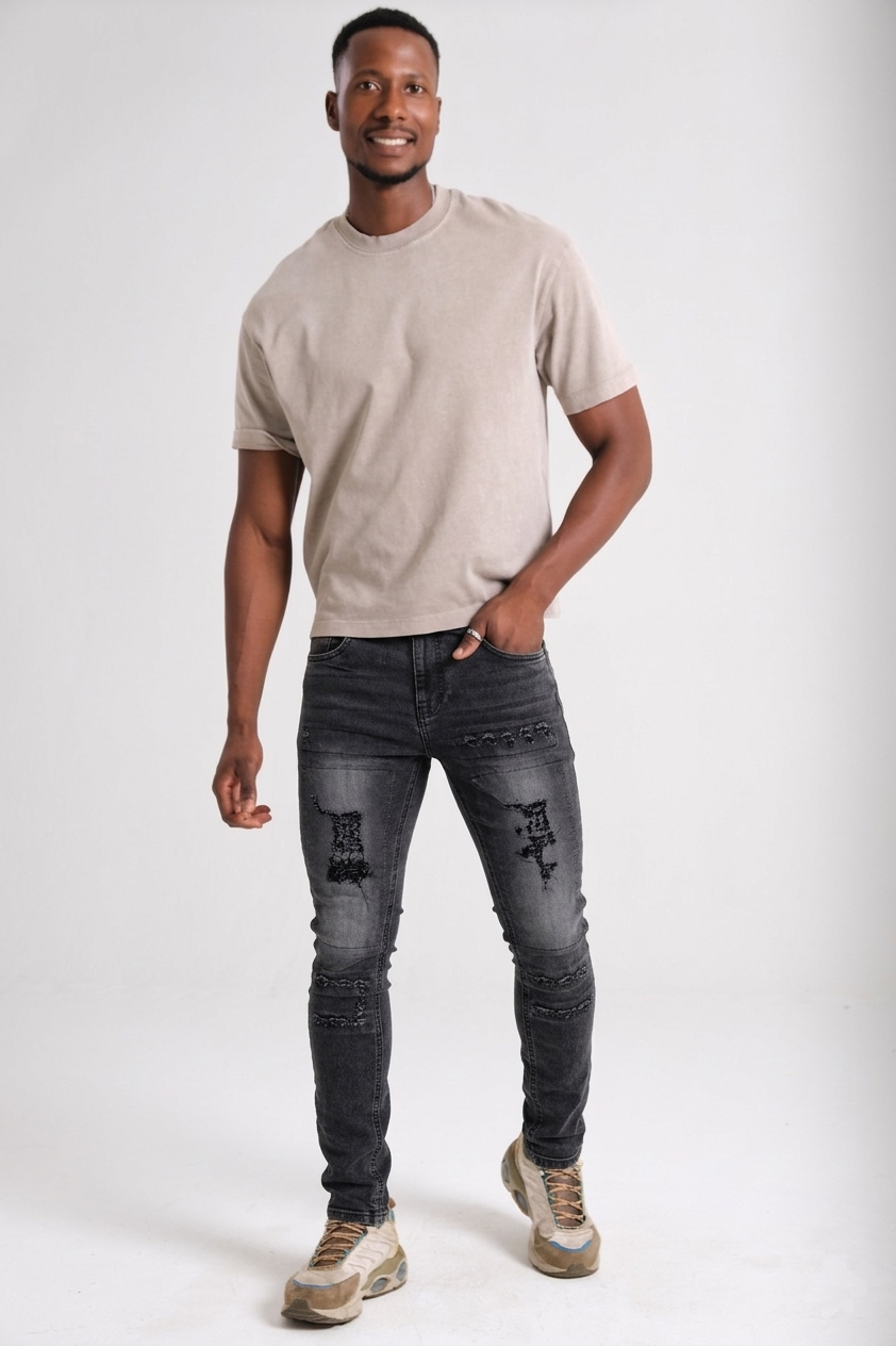 Men's distressed ripped black skinny jeans with enzyme wash — Clutch Denim SA
