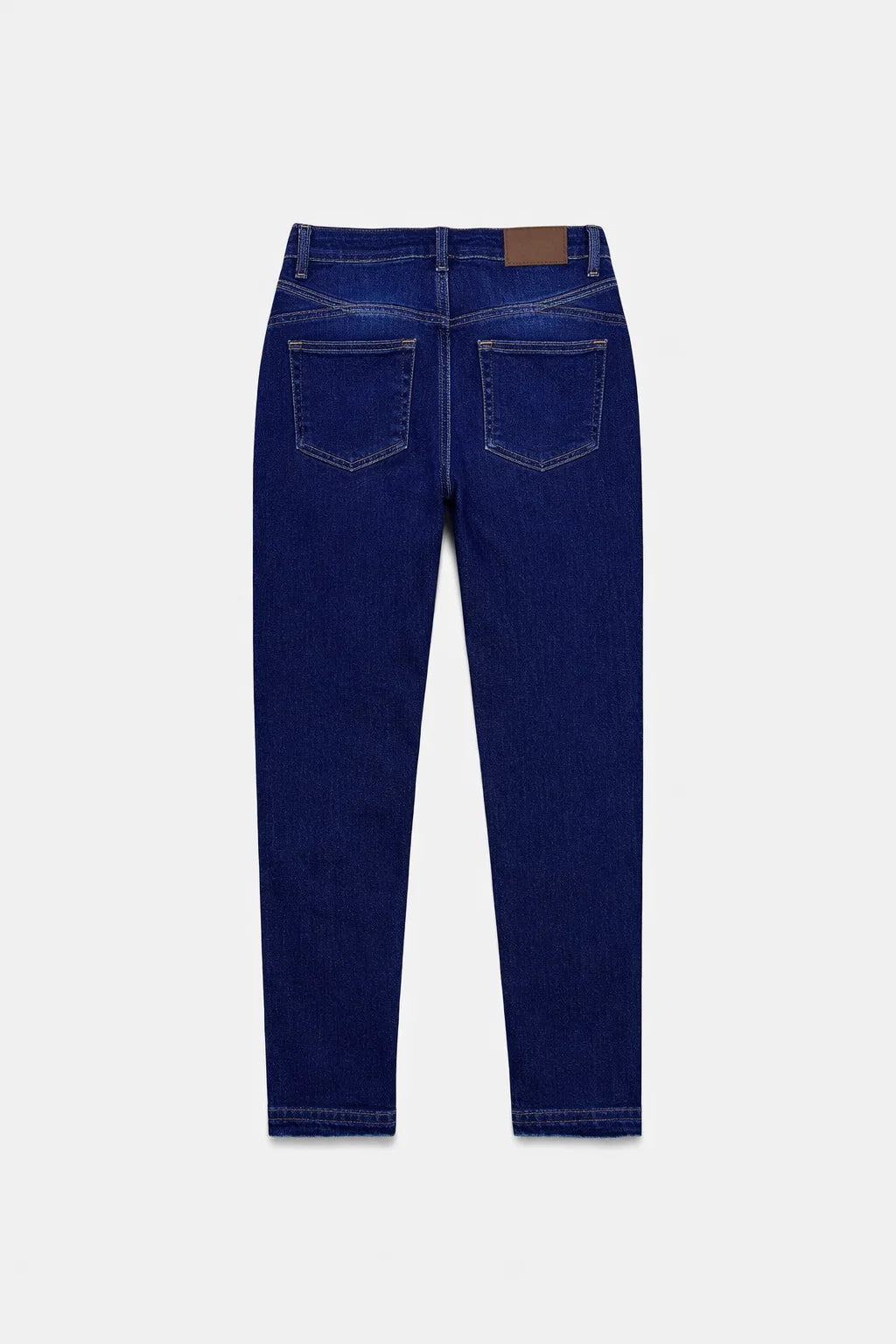 Women's dark wash skinny jeans flat lay — Clutch Denim