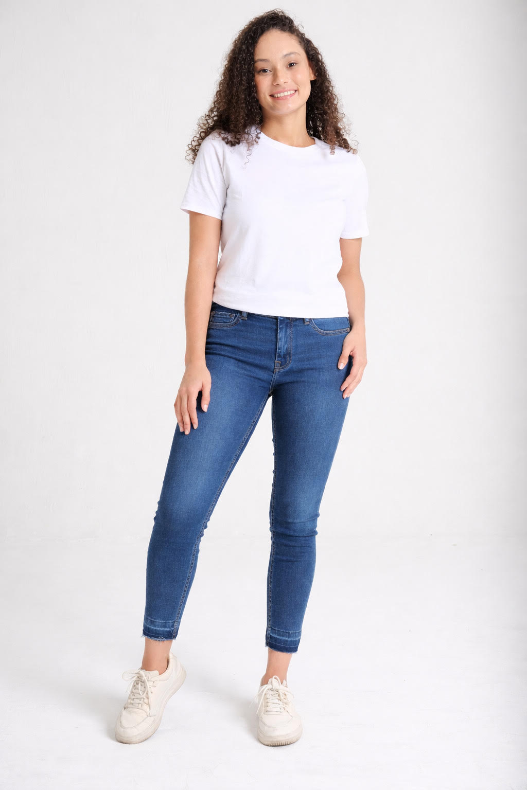 Women's high-rise skinny jeans in medium wash denim — Clutch Denim SA